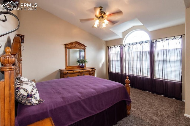 carpeted bedroom featuring ceiling fan and lofted ceiling