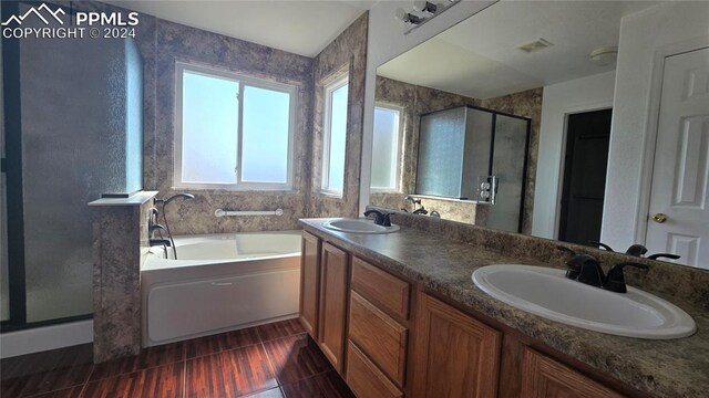 bathroom with vanity, shower with separate bathtub, and tile patterned floors