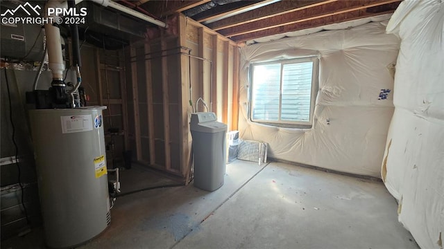 basement featuring gas water heater