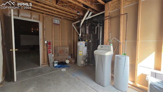 utility room featuring water heater