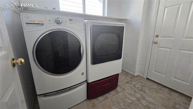 laundry room with separate washer and dryer