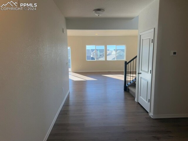 office space with hardwood / wood-style flooring and crown molding