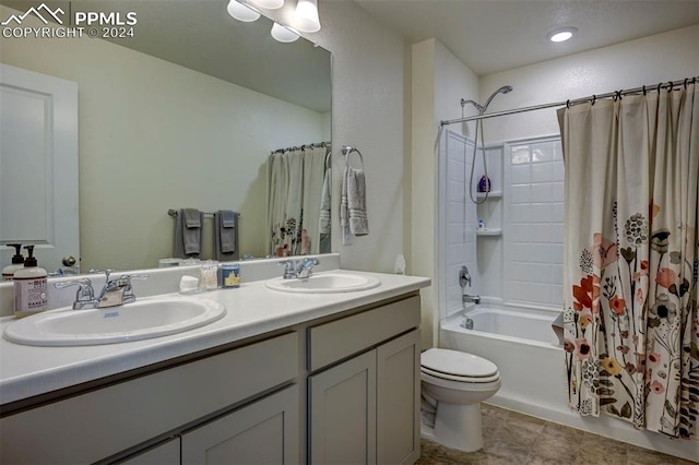 full bathroom featuring tile patterned flooring, double sink vanity, shower / bathtub combination with curtain, and toilet