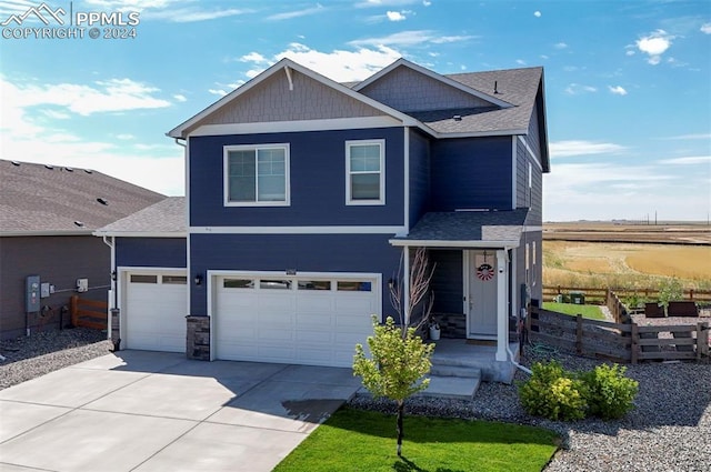 view of front of home with a garage and concrete driveway