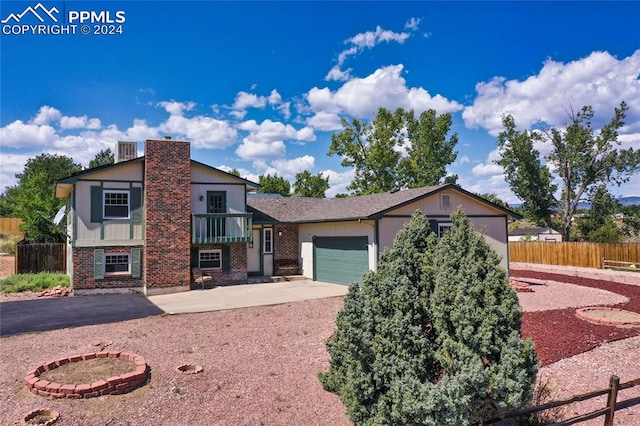 split level home featuring a garage