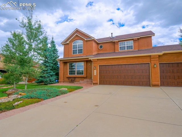 view of front of house with a garage