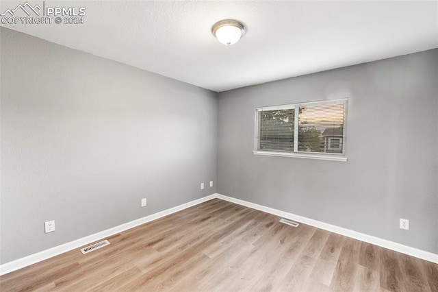 empty room featuring light hardwood / wood-style floors