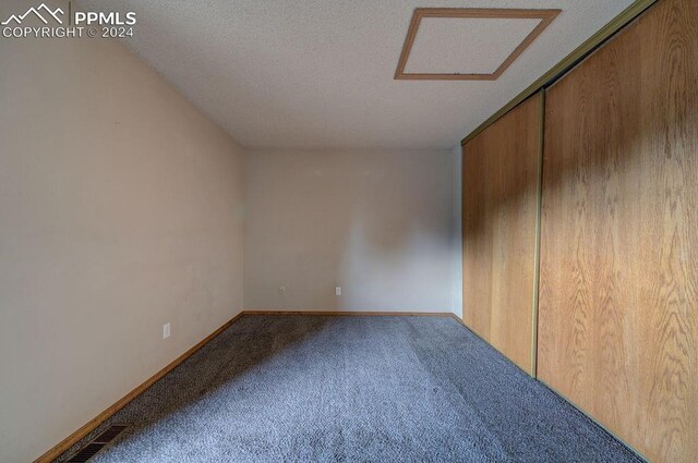 interior space with a textured ceiling