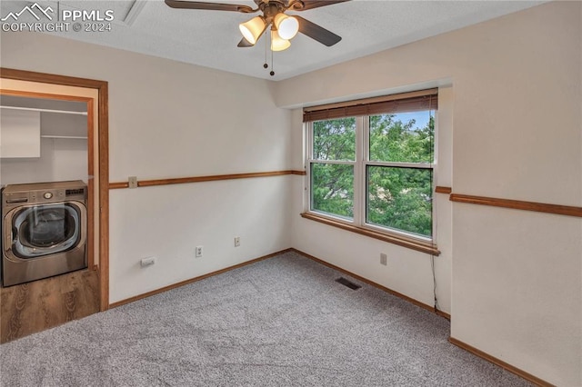 washroom featuring carpet flooring, ceiling fan, and washer / clothes dryer