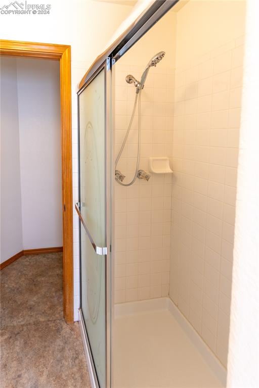 bathroom with an enclosed shower