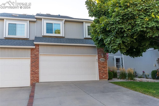 view of front of home with a garage