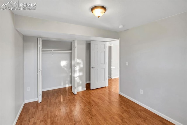 unfurnished bedroom featuring light hardwood / wood-style floors