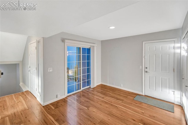 entrance foyer featuring light hardwood / wood-style floors