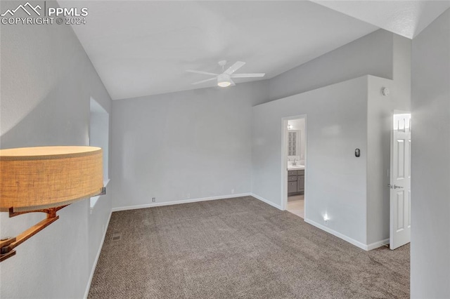 empty room with ceiling fan and light colored carpet