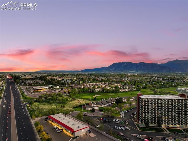 aerial view at dusk with a mountain view