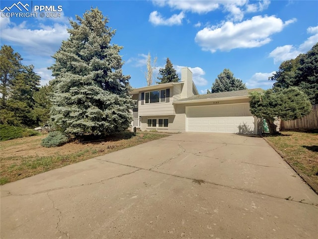 view of front of property with a garage