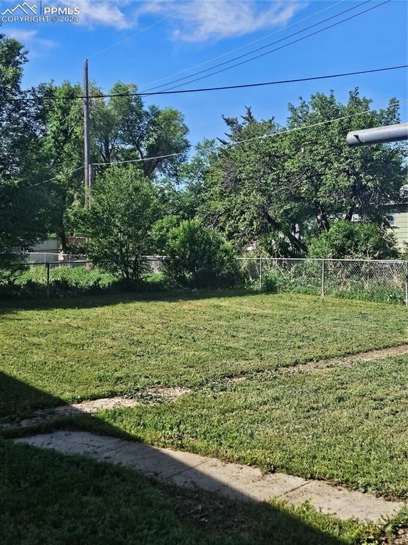 view of yard with fence