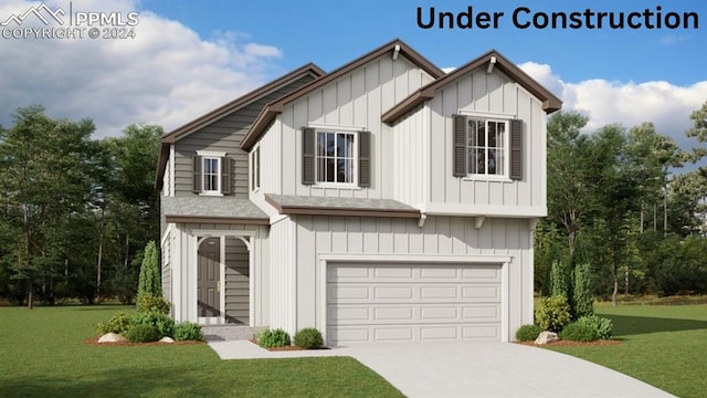 view of front of house featuring a garage and a front yard