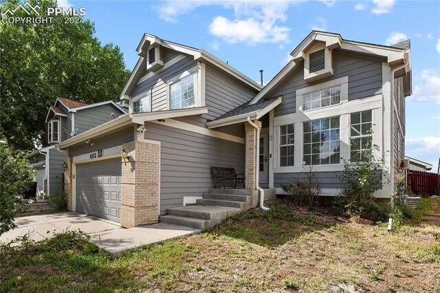 view of front of property featuring a garage