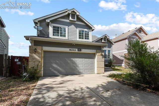 craftsman inspired home with a garage