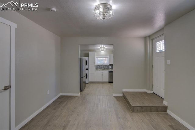 foyer featuring light wood-type flooring