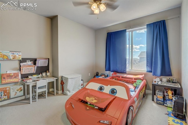 bedroom featuring ceiling fan and carpet flooring