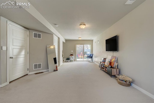 living room featuring carpet flooring