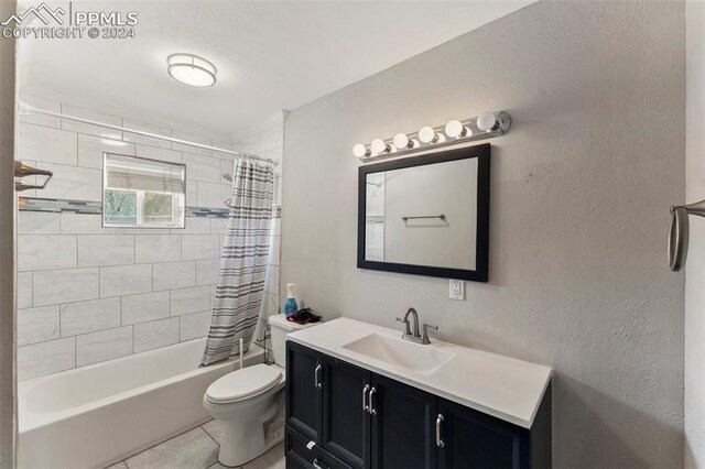 full bathroom featuring vanity, toilet, shower / tub combo with curtain, and tile patterned floors