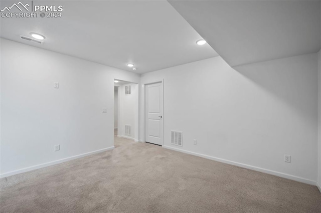 view of carpeted spare room