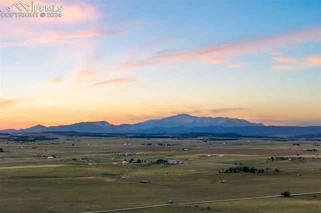 property view of mountains with a rural view