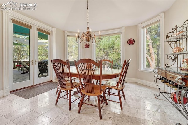 dining area with a notable chandelier