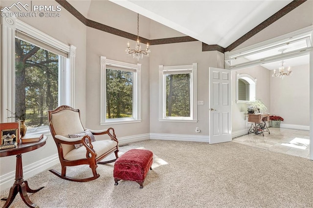 living area featuring high vaulted ceiling, an inviting chandelier, and carpet floors