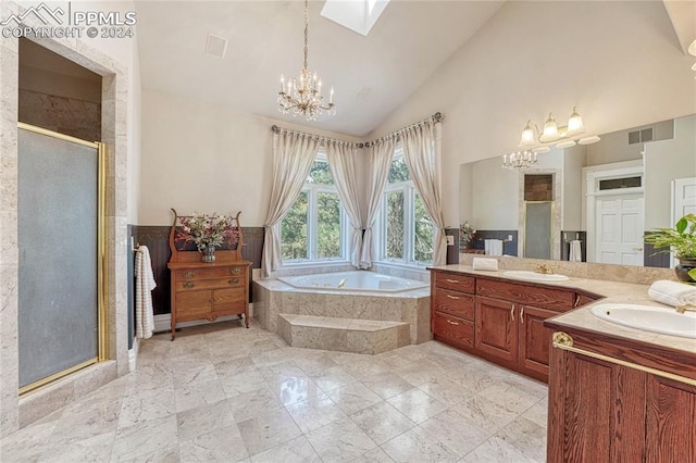 bathroom featuring vanity, high vaulted ceiling, independent shower and bath, and a chandelier