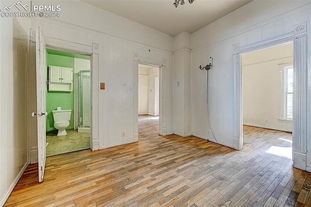 spare room with light hardwood / wood-style flooring