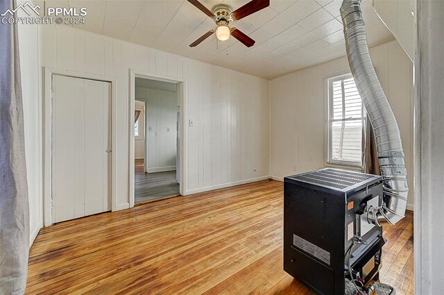 interior space featuring ceiling fan and light hardwood / wood-style flooring