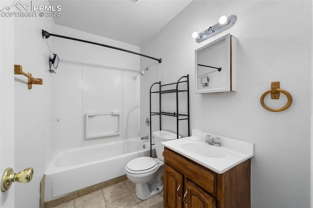 full bathroom with tile patterned flooring, bathing tub / shower combination, toilet, and vanity