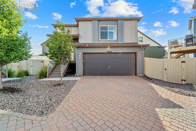 view of front of property with a garage