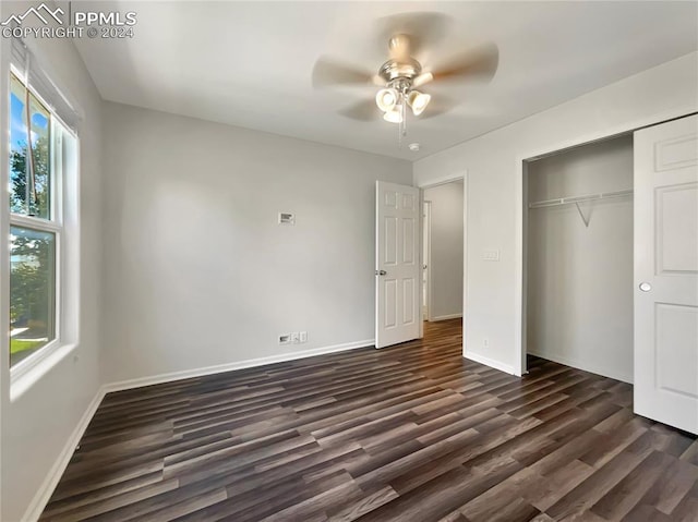 unfurnished bedroom featuring a closet, ceiling fan, and hardwood / wood-style floors