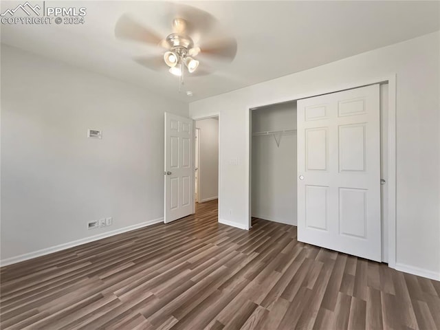 unfurnished bedroom featuring ceiling fan, wood-type flooring, and a closet