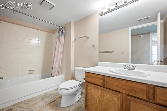 140 W Rockrimmon Blvd Unit 204, Colorado Springs, CO 80919 - bathroom with shower / tub combo, visible vents, vanity, and toilet