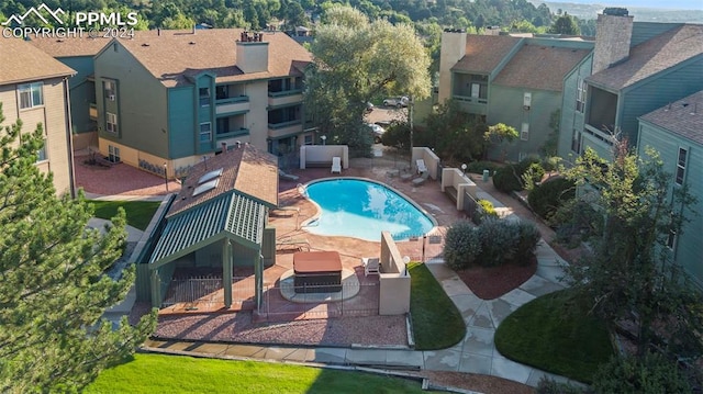 view of pool featuring a patio