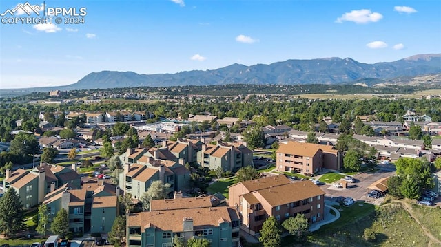 bird's eye view with a mountain view