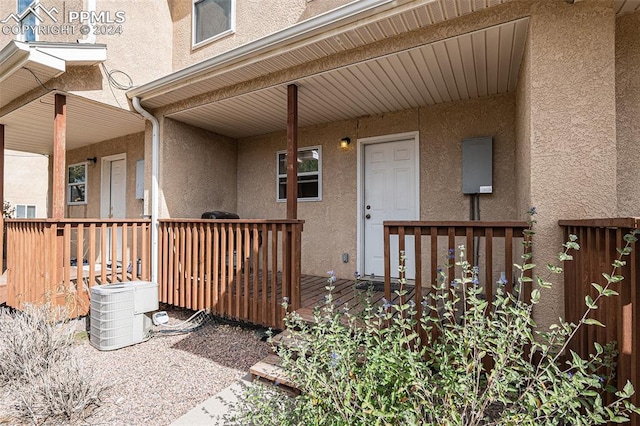 doorway to property with a porch