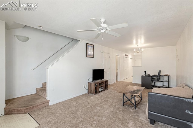 living room with carpet flooring and ceiling fan with notable chandelier