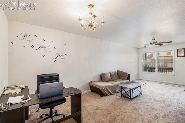 office featuring carpet floors and ceiling fan with notable chandelier