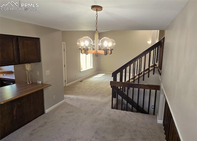 interior space with light colored carpet and a notable chandelier