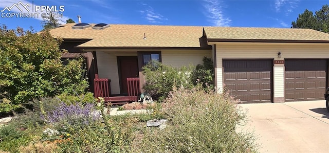 ranch-style house with a garage