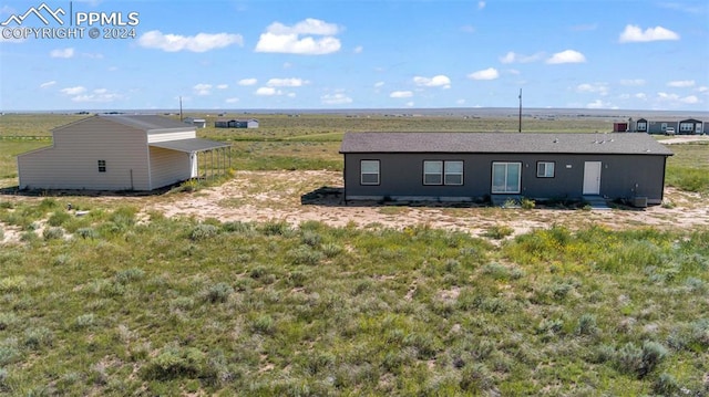 exterior space featuring a rural view