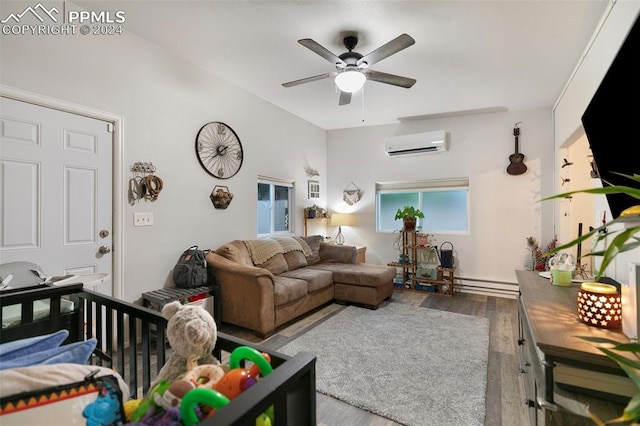 living room with baseboard heating, a wall mounted AC, ceiling fan, and hardwood / wood-style floors