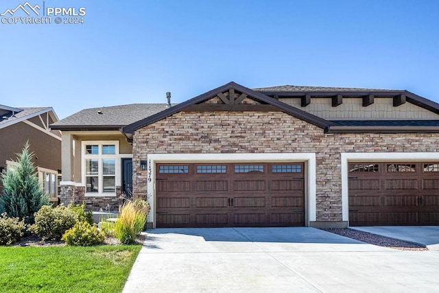 craftsman inspired home featuring a garage